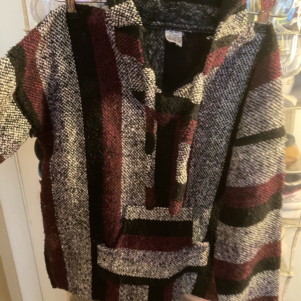 Thick shrug sweater.
